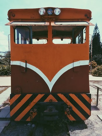 Orange, White, and Brown Train