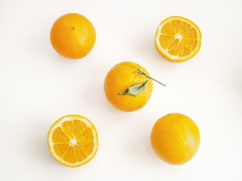 Oranges on White Surface