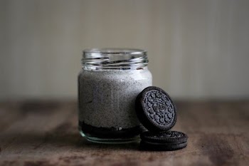 Oreo cookie and glass bottle