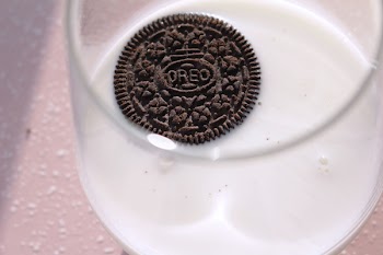 Oreo dipped in milk 