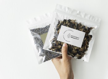 Organic tea branding and packaging mockup Free Psd