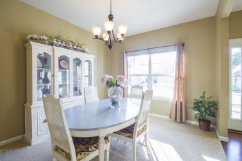 Oval Wooden Dining Table With Four Chairs