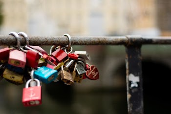 Padlocks on Metal Bar