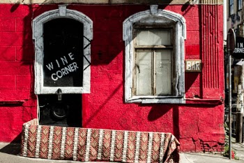 Painted in red. Street corner