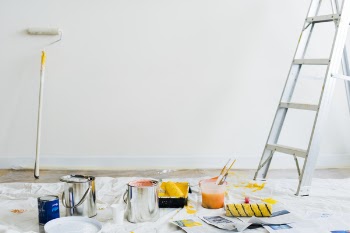 Painting Materials Scattered Inside Room