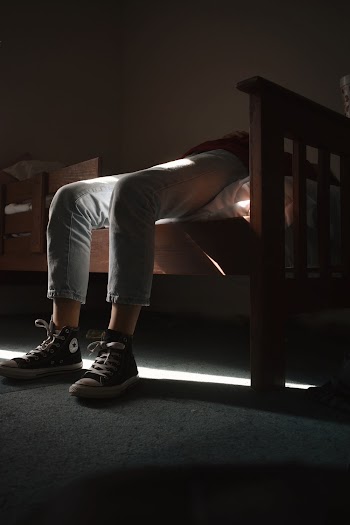 Pair of Black-and-white Converse All-star and Gray Denim Jeans
