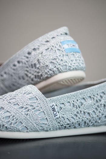 Pair of Blue Toms Slip-ons on Gray Surface