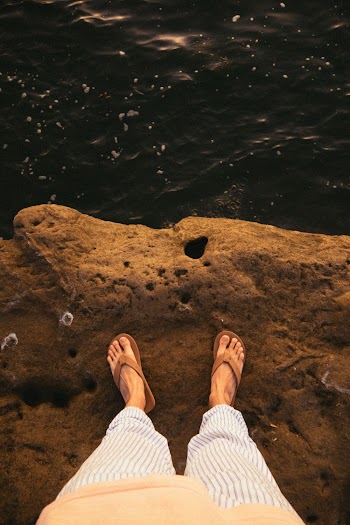 Pair Of Brown Flip-flops