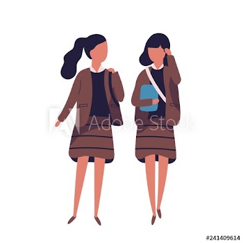 Pair of girls dressed in school uniform
