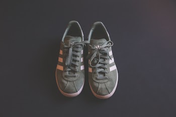 Pair of Gray Adidas Plimsolls