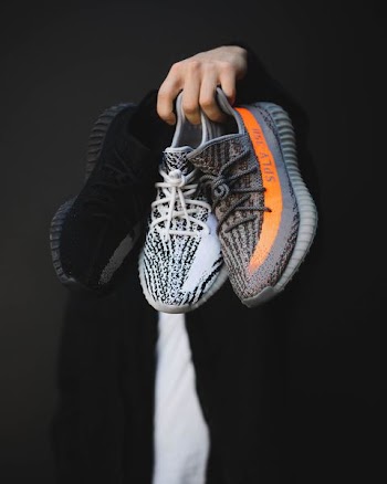 pair of gray adidas Yeezy Boost 350 V2 shoes