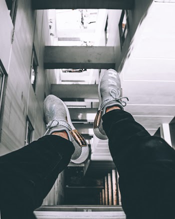 Pair of Gray-and-white Athletic Shoes