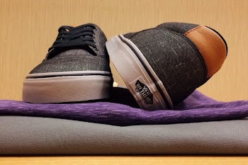 Pair of Gray-and-white Vans Low-top Sneakers