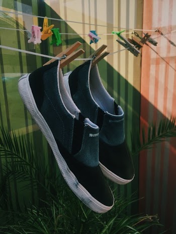 Pair of Shoes Hanged on Clothes Line