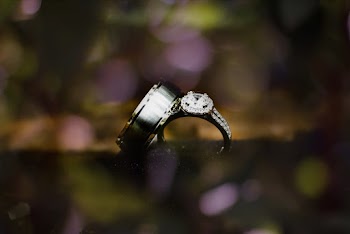 Pair of Silver-colored Rings Selective Focus Photography
