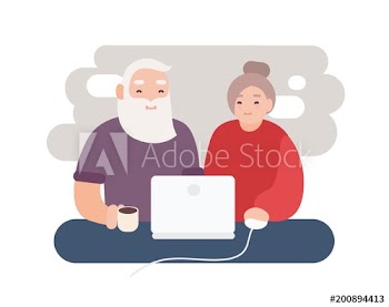 Pair of smiling elderly man and woman surfing internet together