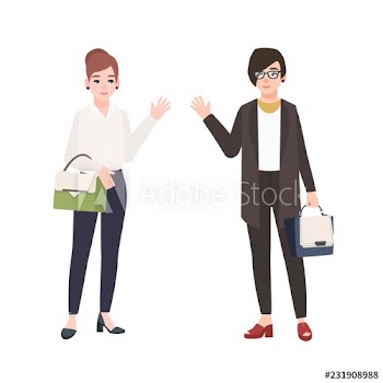 Pair of smiling women dressed in business clothes or female office workers greet each other