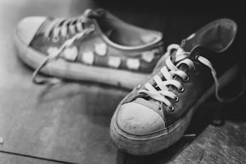 Pair Of Sneakers On Floor