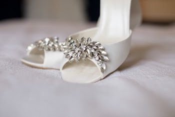 Pair of White Leather Stilettos