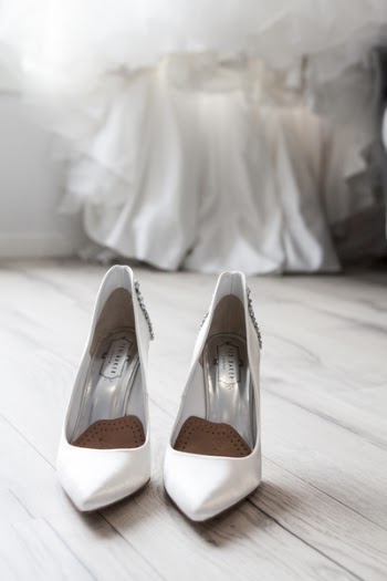 Pair of Women's White Pointy-toe Leather Platform Heels