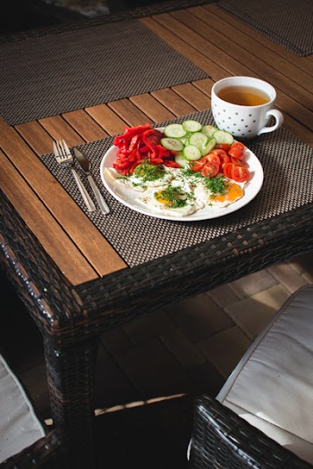 Paleo breakfast eggs with vegetables outside 