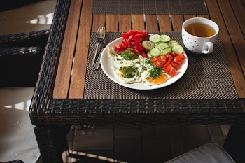 Paleo breakfast eggs with vegetables outside 
