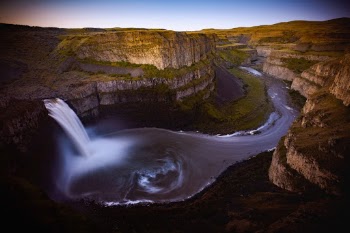 Palouse Falls Dawn. Palouse Falls is located in an area of southeastern Washington where the scenery is much different than what you would typically associate with the PNW. It's a beautiful area of rolling hills and fields of grass. In the middle of it all is this waterfall, with one of the coolest little campgrounds just off the side.