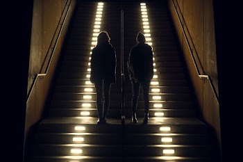 Pals Stand On Lit Steps