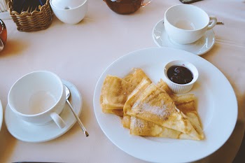 Pan Cakes Served on White Ceramic Plate