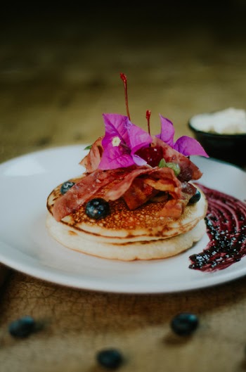 Pancake With Blueberry Toppings on White Ceramic Plate