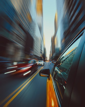 Panning Photo of Yellow Car