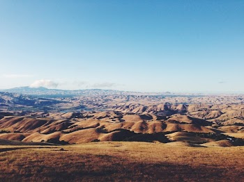 panoramic photo of sand dunes