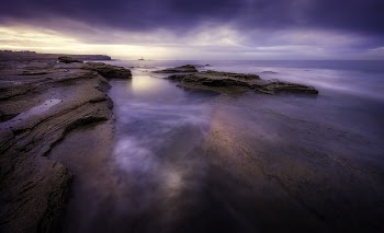 Panoramic Photography of Body of Water Near Rock Formation