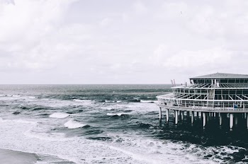 panoramic photography of structure on body of water