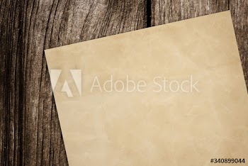 Paper on wood background
