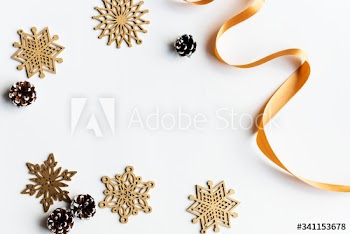 Paper snow flakes on white background with design space