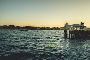 Parasol on Dock Near Body of Water
