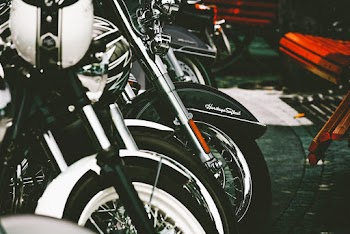 Parked Black and White Cruiser Bikes