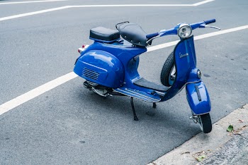 Parked Blue Motor Scooter