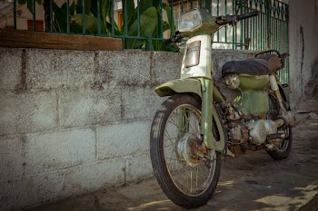 Parked Green and Black Motorcycle