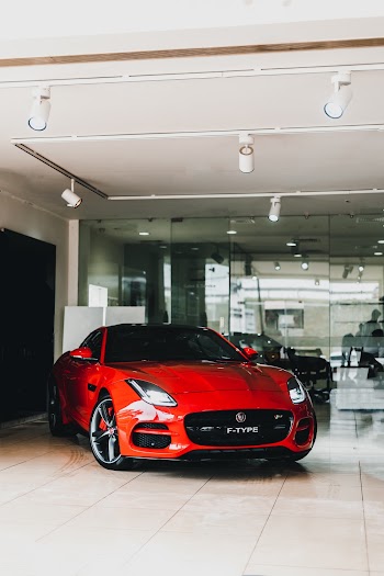Parked Red Vehicle Inside Building