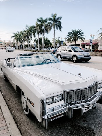 Parked White Coupe