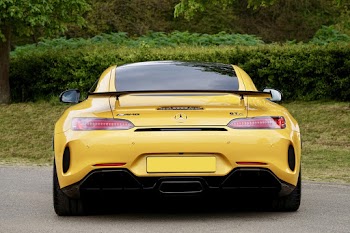 Parked Yellow Mercedes-benz Vehicle