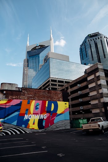 Parking Lot Behind Tall Buildings