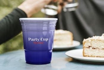 Party cup mockup psd on a table | Free PSD Mockup - rawpixel