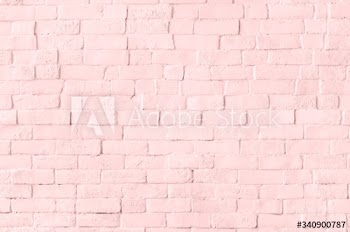 Pastel pink brick wall textured background