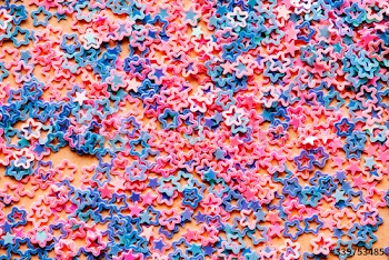 Pastel star sequin abstract background