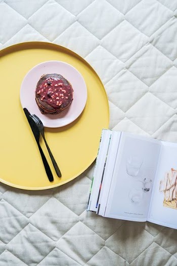 pastry on plate near knife and fork