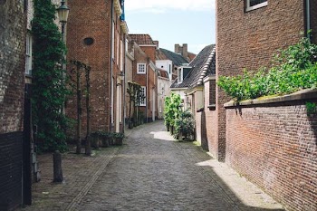 pathway in the middle of buildings