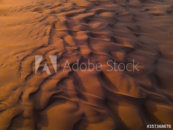 Pattern on sand dunes during sunset